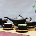 Bộ ấm chén tử sa Aladin kèm phụ kiện bọc đồng